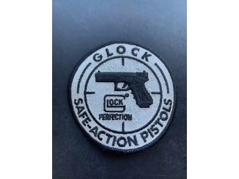 äldre Tygmärke GLOCK Vapen jaktgevär Pistol skytte jakt gevär revolver