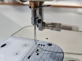 Snabbfäste för pressarfot