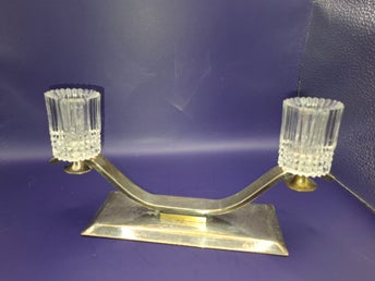 Ljusstake i metall och glas