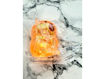 Squishy figur orange med glitter