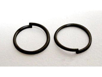 Drygt 100 Nickelfria Svarta öppna motringar 7 mm