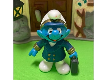 Smurf som flygkapten…..fint lekt skick…