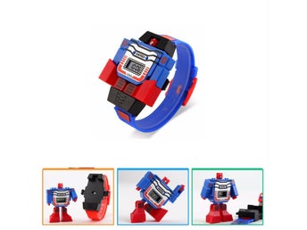 Transformers figur + digitalt armbandsur.