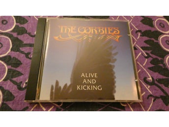 The Corbies - Alive and Kicking. CD-skivan ser ospelad ut! Mycket fint skick!