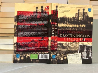 Drottningens Hemlighet av Johan Åsard, bok, Very Fine