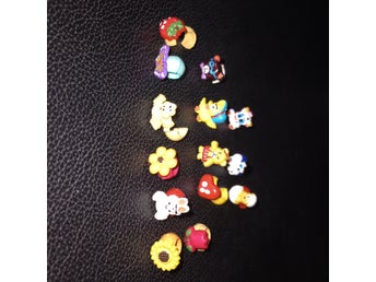 set med nya hårklämmor med små figurer ( bamse )
