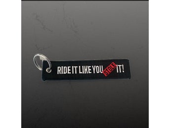 Ride it like you stole it nyckelband.