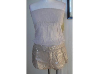 Snygg beige byxdress jumpsuit paljett neder del från Zara ny