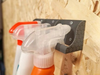 Sprayflaskhållare