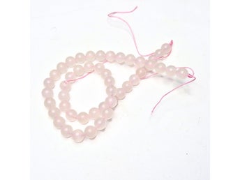 en sträng rosa manganokalcit 8 mm (ca 45 pärlor)