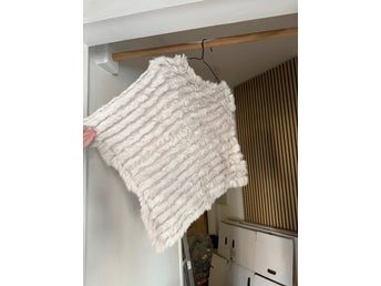 Grå poncho
