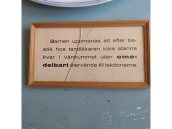 Gammal skylt från tandläkare