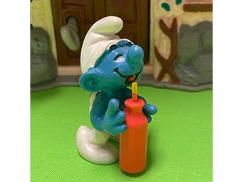 Törstig smurf med orange flaska....lågt utrop…