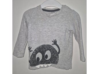 Grå häftig tröja med monster, storlek 68