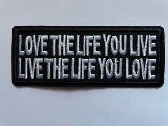 LIVE AND LOVE ... TYGMÄRKE