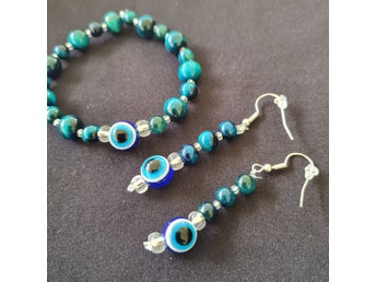 FRI FRAKT! 3'e ögat! (onda ögat) Armband, örhängen och nyckelring..