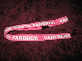 VÄRLDENS BÄSTA FARBROR NYCKELBAND (ROSA