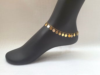 Ankar fotlänk i 18k guld 25 cm med berlocker