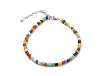 Vristlänk med Multi color glaspärlor, c:a 24 cm. lång +förlängnings kedja.