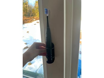 Vägghållare för eltandborste