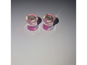 Jättecoola Rosa örontöjningar 8 mm med glitter!