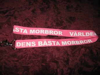 VÄRLDENS BÄSTA MORBROR NYCKELBAND (ROSA