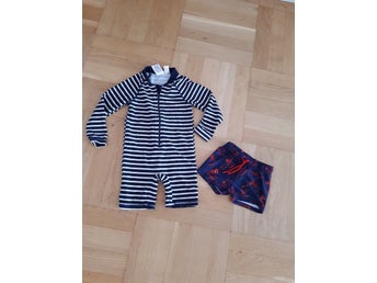 Marinblå vitrandig uv-dräkt , lindex stlk 86 92