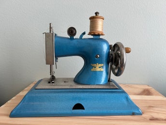 Antik Casige leksakssymaskin 1940-tal retro