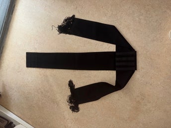 Svart bandbä (cincture/fascia)