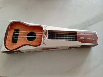 Helt ny Barn ukulele gitarr leksak