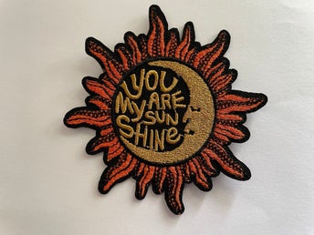 YOU ARE MY SUNSHINE TYGMÄRKE