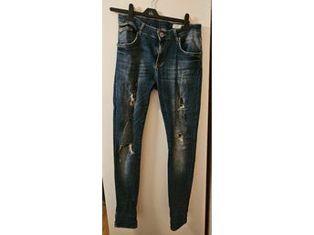 157 mörkblå jeans, storlek L
