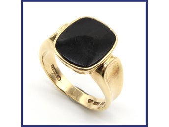 Ring, 18K guld, svart sten (vikt 5,05g, stl 19,65mm)
