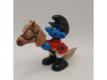 Smurf - Ryttare på Käpphäst / Häst , Peyo