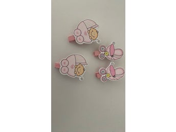 Rosa trä dekoration med klämma