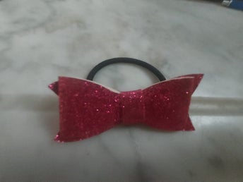 Hårsnodd KNALLROSA glittrande Bredd ca 7 cm Höjd ca 3 cm