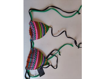 H&M flerfärgad bikiniöverdel, storlek 34. Oanvänd.