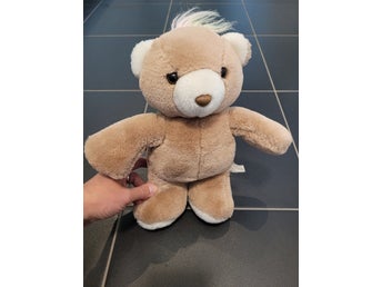 Söt och kramgo mjuk teddybjörn, gosedjur, nallebjörn