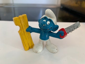 Smurf med såg och träbit, Peyo