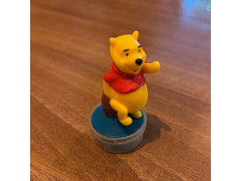 Nalle Puh figur på honungsburk stämpel