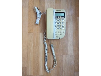 Gammal fast telefon med knapptryckning