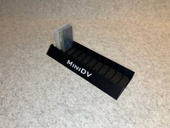 Ställ för 12 MiniDV kassettband