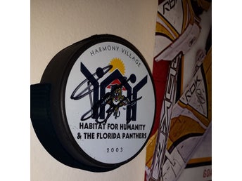 Vägghållare för hockeypuck