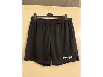 Kempa svart shorts, storlek M