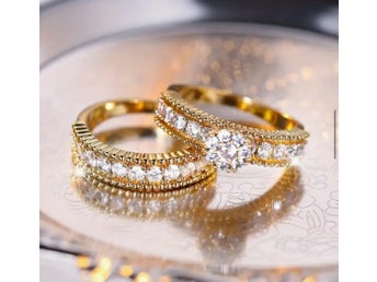 2 st. set helt nya ringar i 18K Guld pläterade i hörgkvalitet str. 15mm