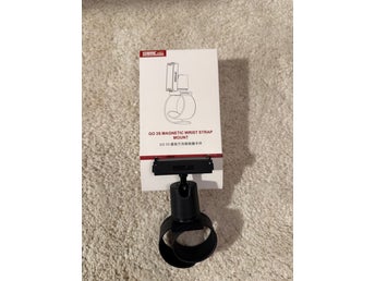 Magnetiskt handledsremfäste för kamera