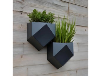 vägghängd blomsterhållare i low-poly design