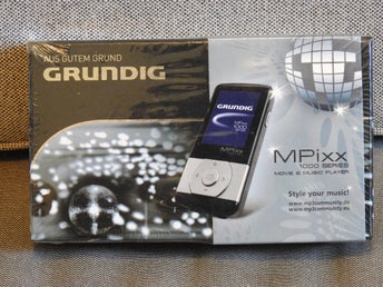 Grundig MPixx 1000 Series 2GB MP3-spelare (defekt) NEW OLD STOCK INPLASTAD