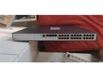 v1910 Switch med 24 portar med POE