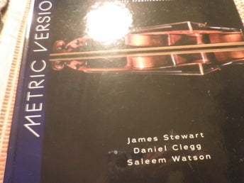 METRIC VERSIO av James Stewart, Daniel Clegg, Saleem Watson
